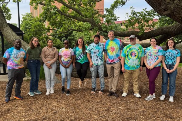 Sherer lab members standing in a row